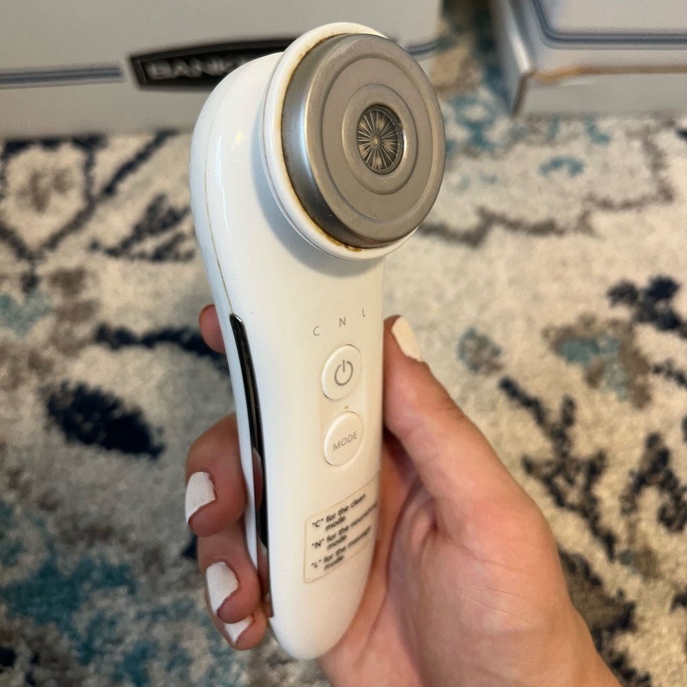 White Handheld Facial Device